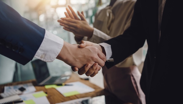 people shaking hands