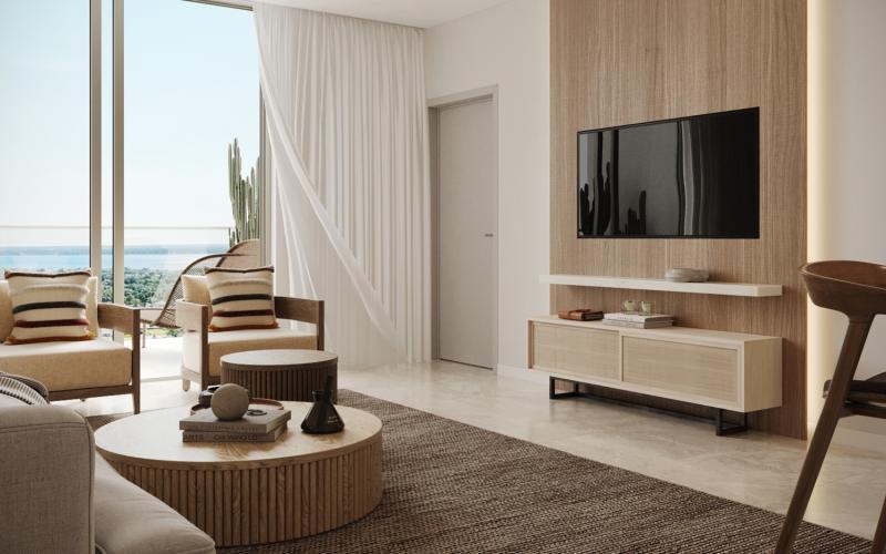 a living room with a tv and couches