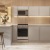 a kitchen with white cabinets