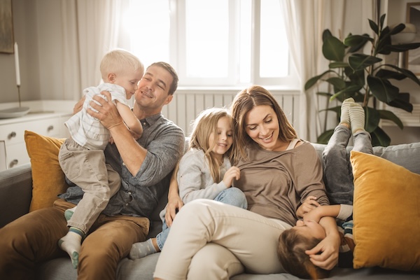 a beautiful family near a window